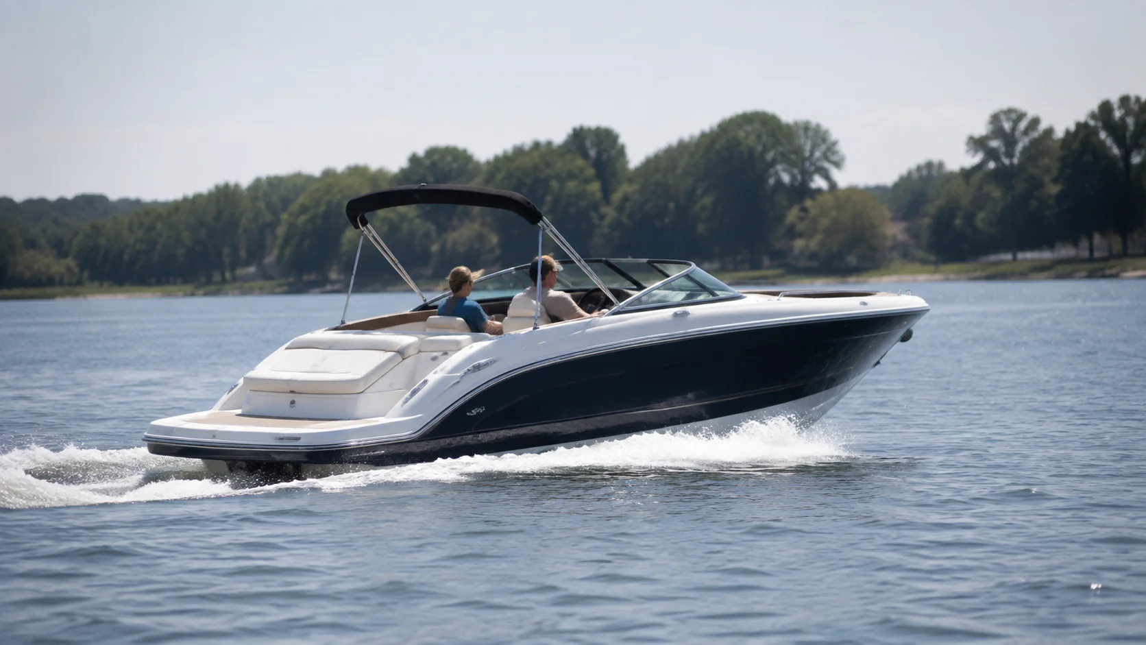 Powerboat cruising on calm Ontario water